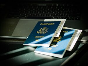 U.S. passport on a keyboard, representing Form N-400 and Form N-600 citizenship applications
